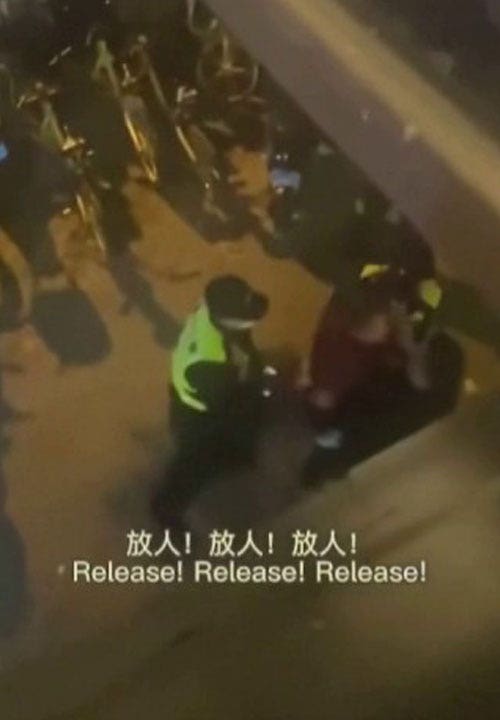 Video shows Chinese officers arresting BBC reporter as China defends detention