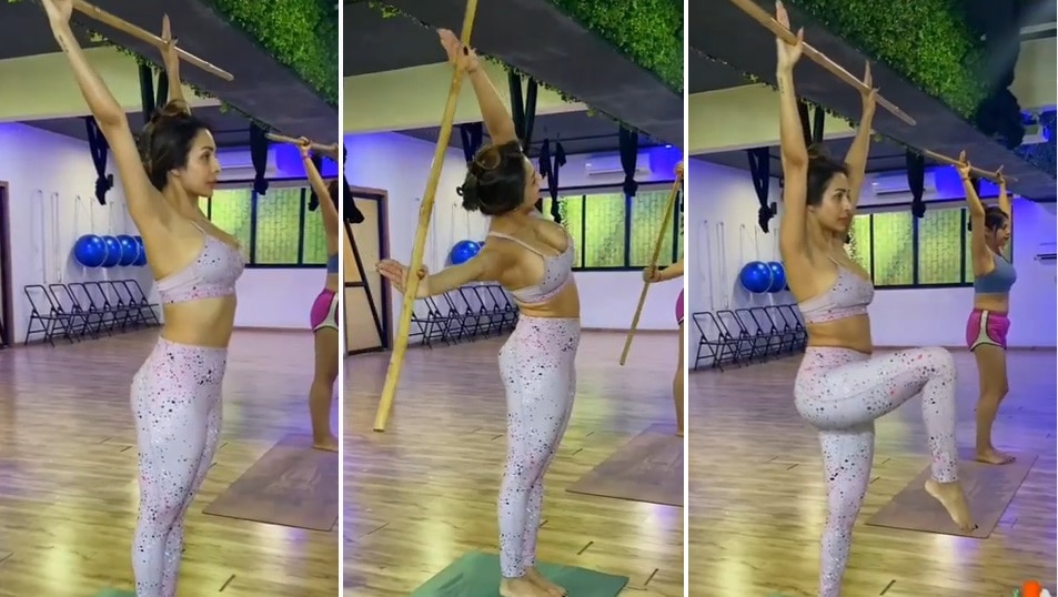 Danda Yoga: Malaika Arora does yoga with stick fabulous workout to reduce belly fat | Malaika Arora: डंडा लेकर Yoga करती हैं मलाइका अरोड़ा, पेट की चर्बी होती जाती है गायब