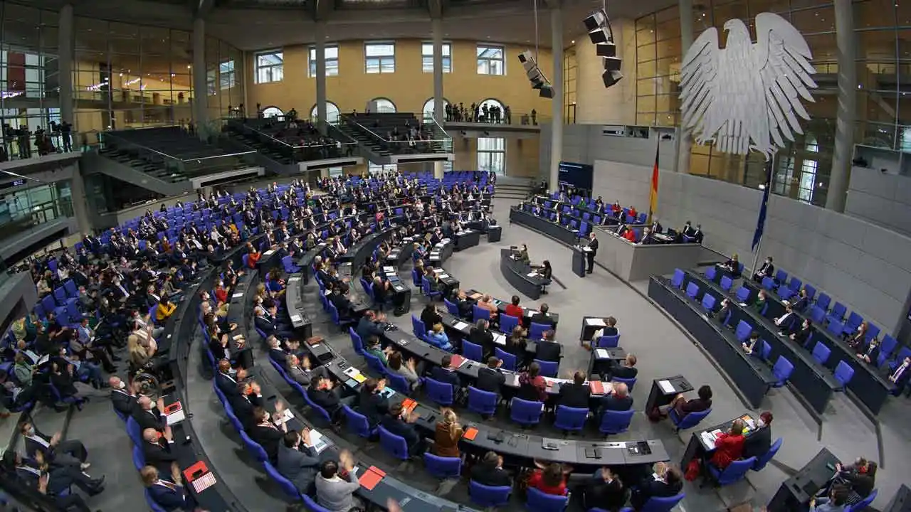 German lawmakers approve electoral reforms to reduce size of country’s parliament