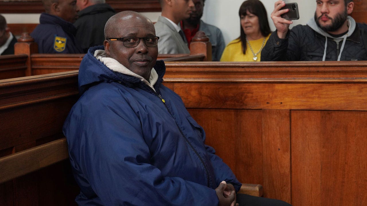 Rwandan genocide suspect seeks political asylum in South Africa after arrest, further delaying extradition