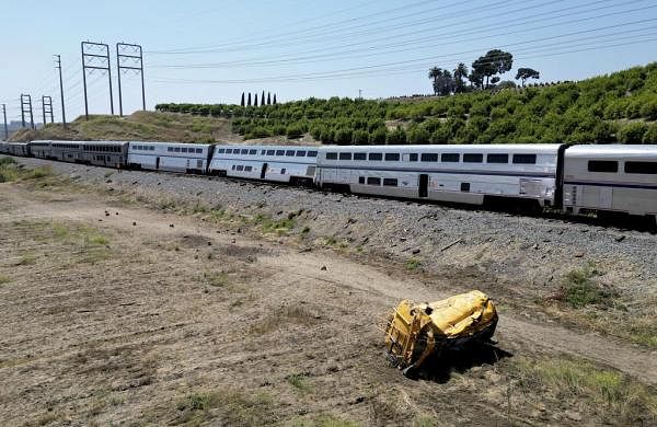 Amtrak train with 198 passengers derails after hitting truck on tracks in Southern California-