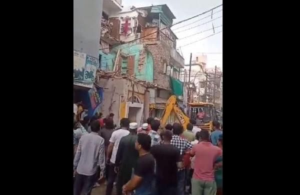 ‘Illegal’ parts of homes of 3 Muslims razed in MP after being accused of ‘spitting’ on procession-