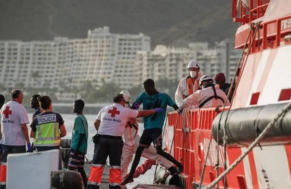Rescuers save 86 migrants from boat near Canary Isles-