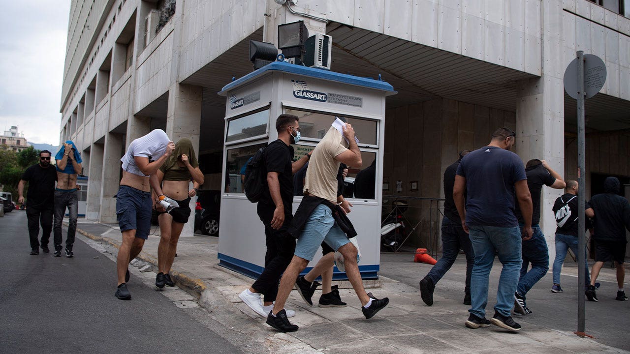 Greek authorities detain 105 soccer fans following clashes, deadly stabbing outside stadium