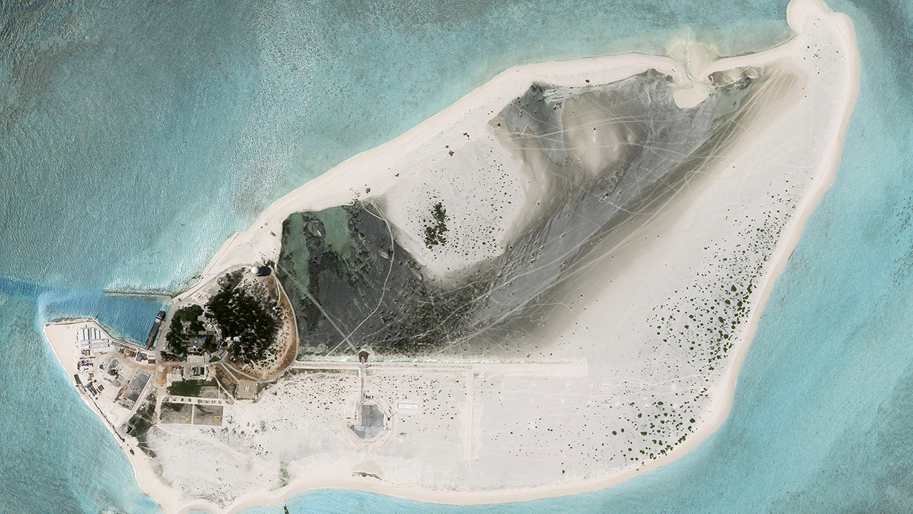 China appears to be constructing airstrip on disputed South China Sea island that is also claimed by Taiwan
