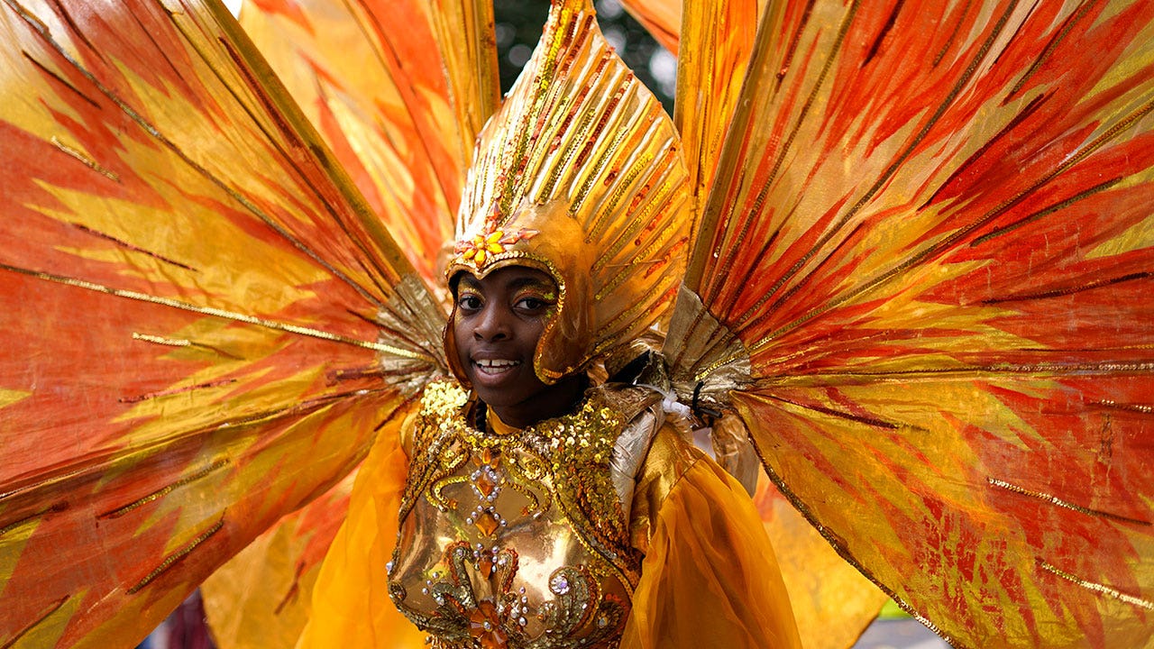Thousands pack streets of London to celebrate Notting Hill Carnival, one of Europe’s largest street parties