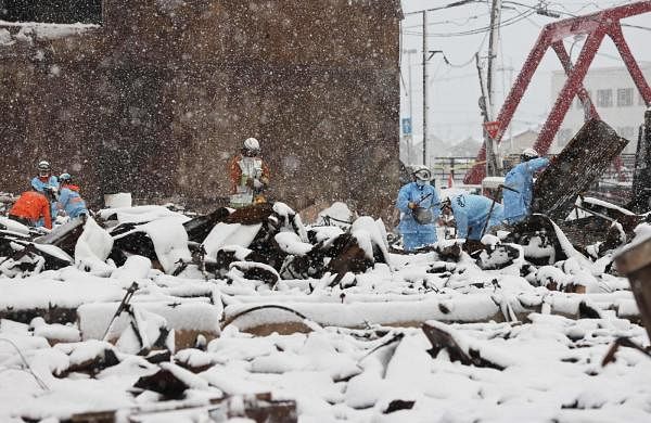 Japan quake toll hits 161 as snow hampers relief-