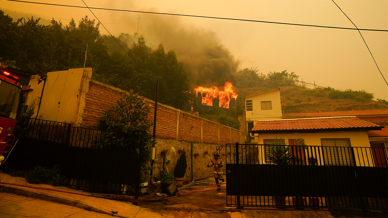 Forest fires in Chile kill at least 51, threatens urban areas