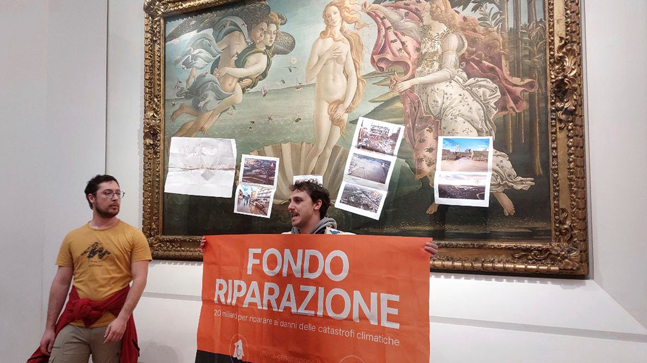 Climate activists in Italy cover Botticelli’s ‘Birth of Venus’ with pictures of flood damage