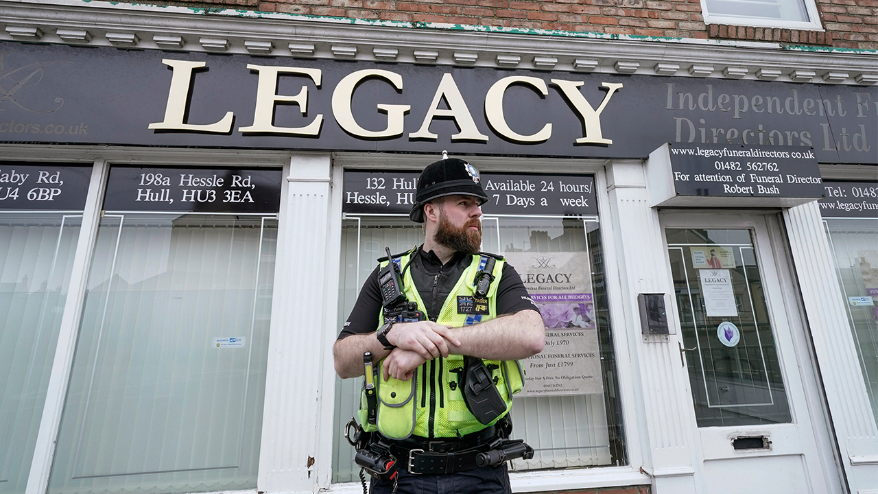 Police remove 34 bodies from funeral home in England, 2 suspects arrested