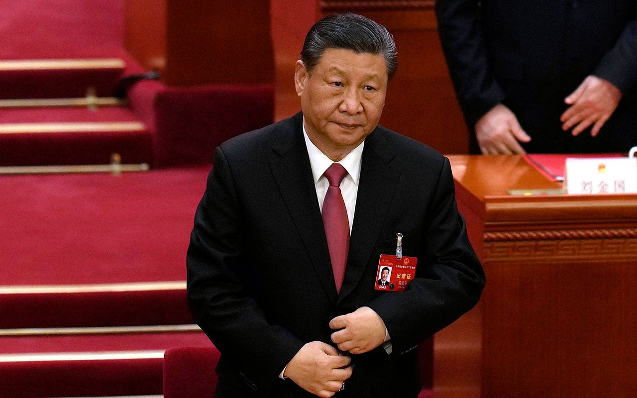China closes annual session with near-unanimous support for Xi Jinping
