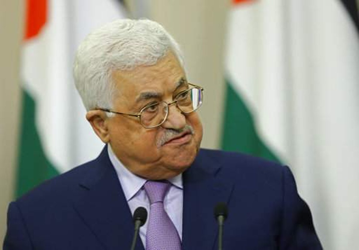 Palestinian leader appoints longtime adviser as prime minister in the face of calls for reforms